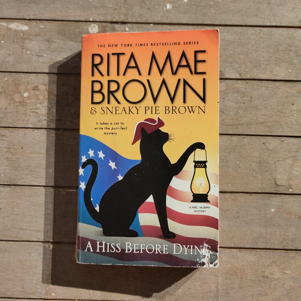 Rita Mae Brown - A hiss before Dying